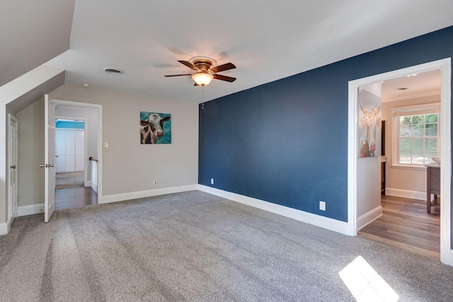 unfurnished bedroom with carpet floors and ceiling fan