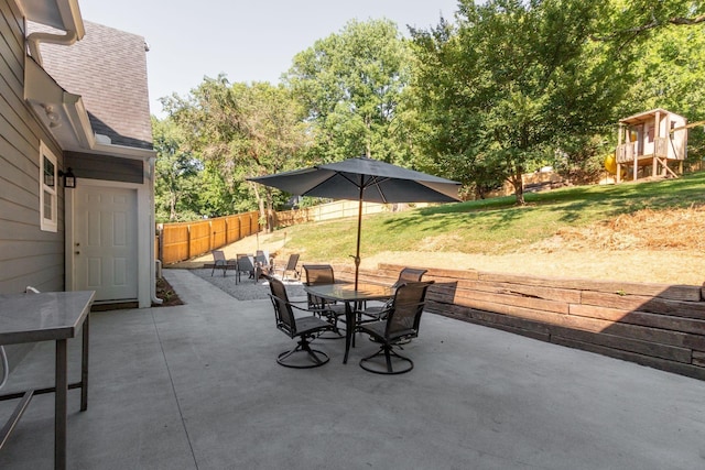 view of patio featuring a playground