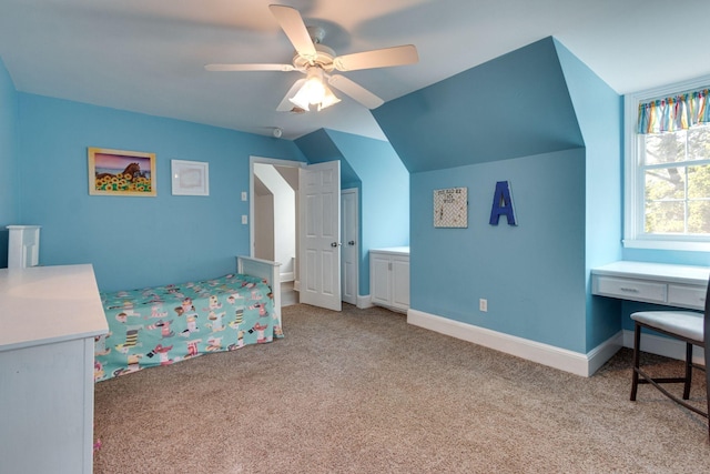 bedroom featuring light carpet, vaulted ceiling, and ceiling fan