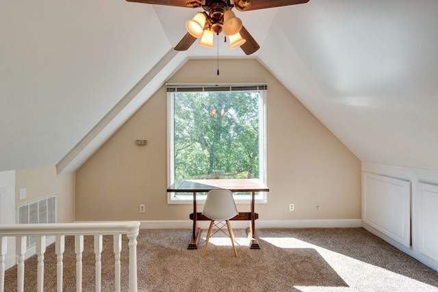 bonus room featuring lofted ceiling and light carpet