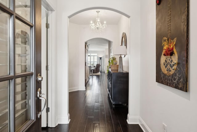 hallway with dark wood-type flooring