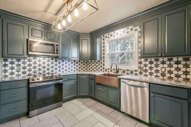 kitchen with light tile patterned flooring, sink, backsplash, stainless steel appliances, and light stone countertops