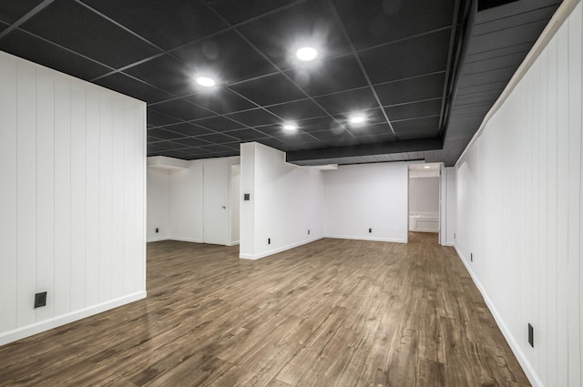 basement with wood-type flooring