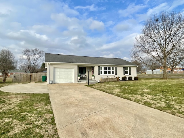 ranch-style house with a garage and a front yard