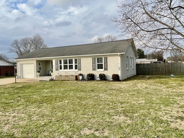 view of front of home with a garage and a front yard