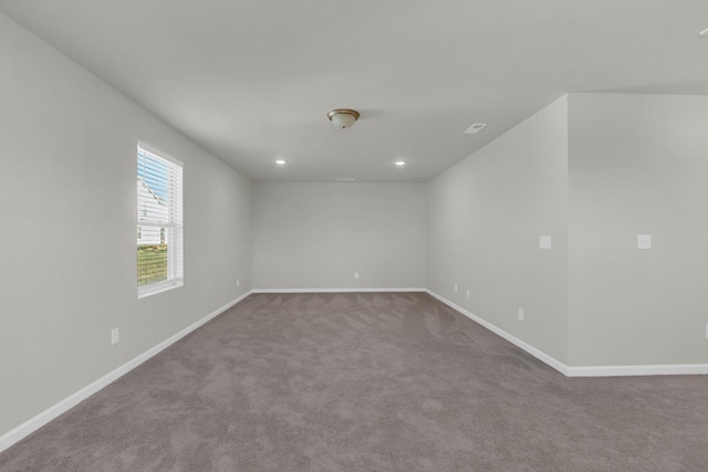 empty room with carpet flooring