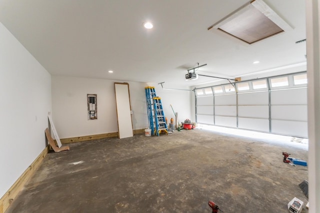 garage featuring a garage door opener