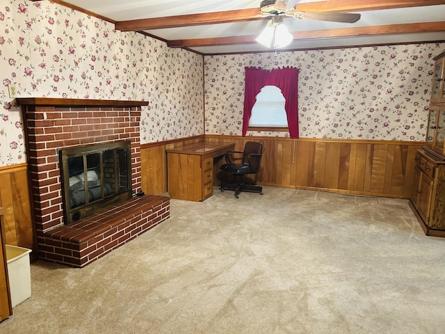 office with light carpet, beam ceiling, a fireplace, and ceiling fan