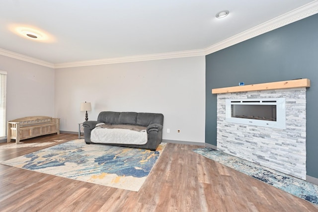 sitting room featuring hardwood / wood-style flooring and ornamental molding