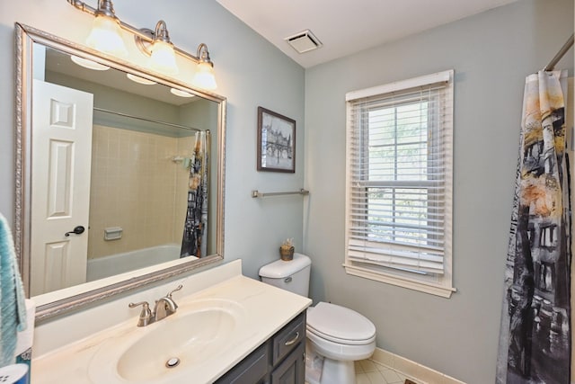 full bathroom with vanity, toilet, and shower / tub combo with curtain