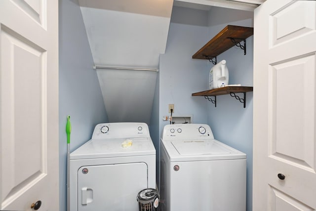 clothes washing area featuring washing machine and dryer