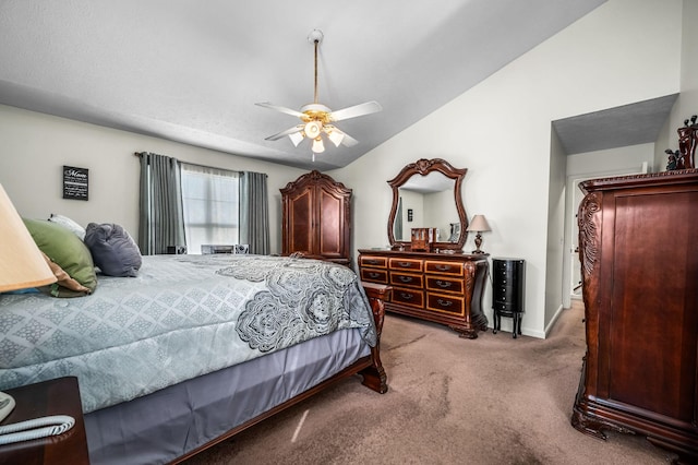 carpeted bedroom with lofted ceiling and ceiling fan