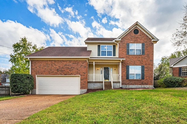 view of front property featuring a porch, a garage, and a front lawn