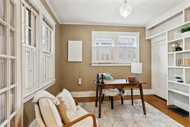 office space with crown molding and hardwood / wood-style floors