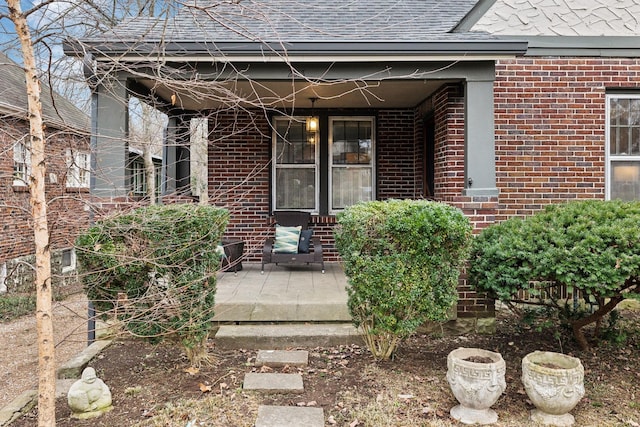 doorway to property with a porch