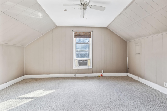 additional living space featuring cooling unit, ceiling fan, lofted ceiling, and carpet floors