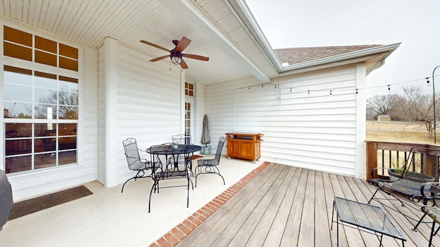 wooden terrace with ceiling fan