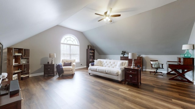 living room featuring ceiling fan, lofted ceiling, and dark hardwood / wood-style flooring