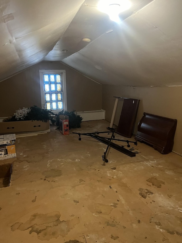 additional living space with vaulted ceiling