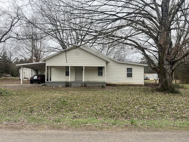 view of front of home with a carport