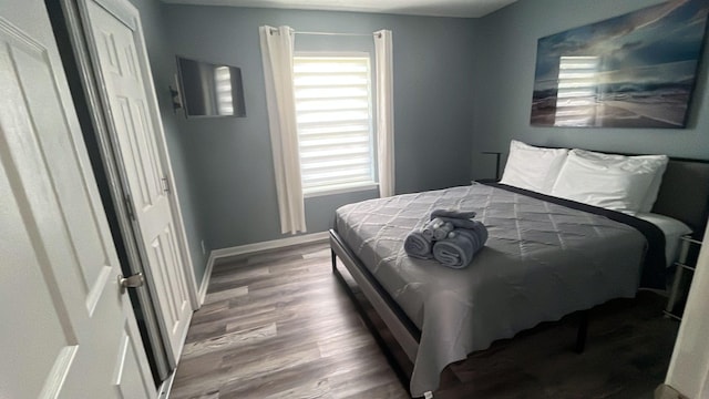 1003 Tyler Dr, Murfreesboro, TN 37130 - bedroom with wood finished floors and baseboards