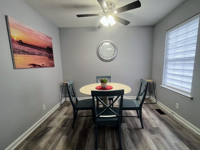 1003 Tyler Dr, Murfreesboro, TN 37130 - dining area with dark wood finished floors, ceiling fan, and a textured ceiling