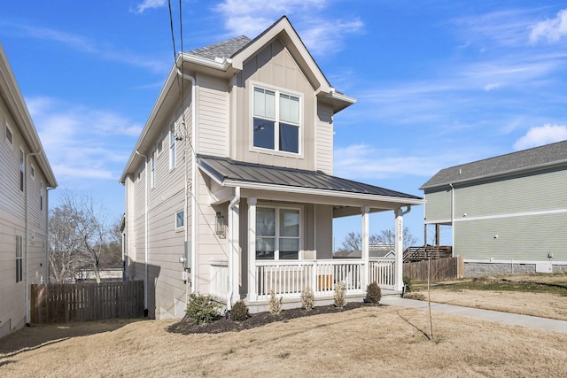 view of front of property featuring covered porch