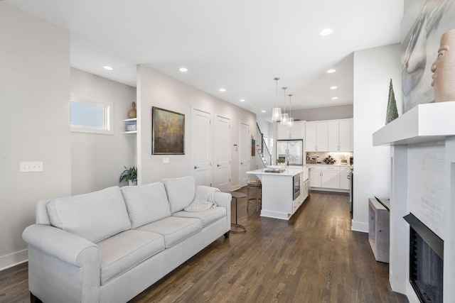 living room featuring dark hardwood / wood-style floors