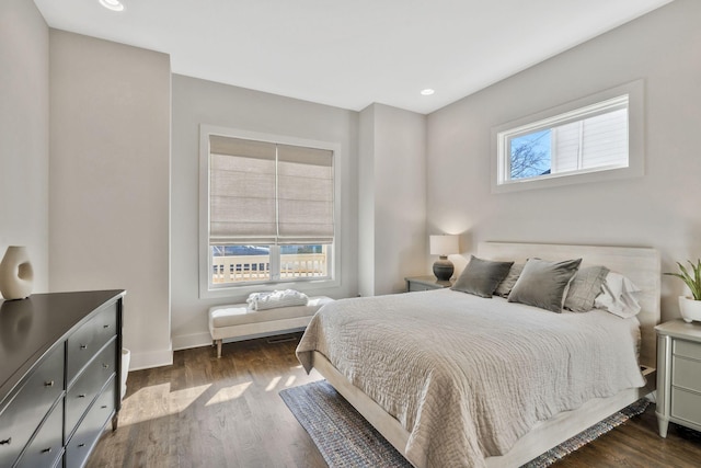 bedroom featuring dark hardwood / wood-style floors