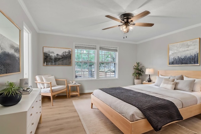 bedroom with ornamental molding, light hardwood / wood-style floors, and ceiling fan