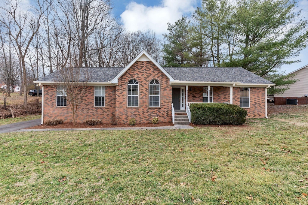 ranch-style home with a front yard