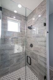 bathroom with an enclosed shower