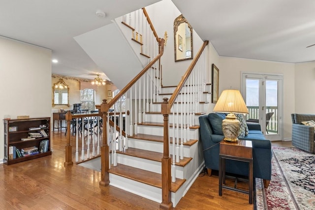 staircase featuring wood-type flooring