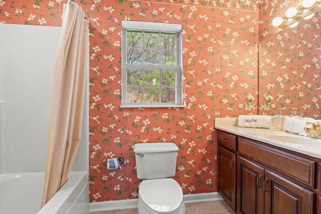 full bathroom with tile patterned floors, toilet, vanity, and shower / bath combo