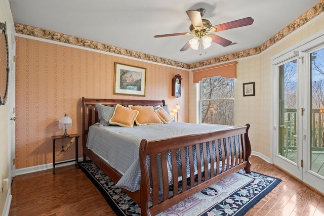 bedroom featuring ceiling fan, access to exterior, and hardwood / wood-style floors