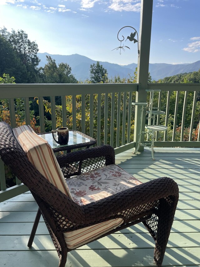 balcony with a deck with mountain view