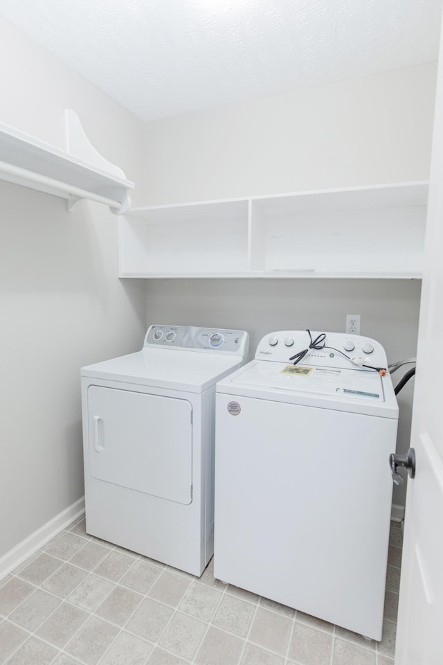 washroom featuring separate washer and dryer