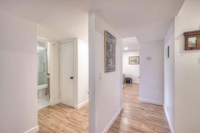 hallway featuring light wood-type flooring