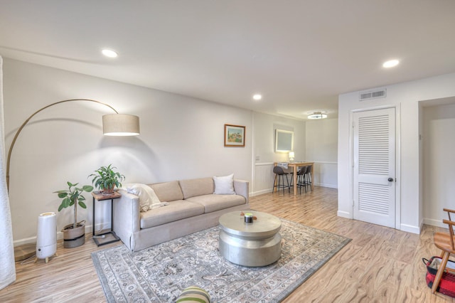 living room featuring light wood-type flooring