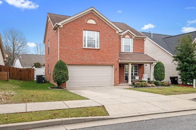 front facade with a garage and a front yard