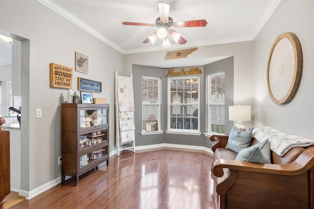 sitting room featuring crown molding, ceiling fan, and hardwood / wood-style floors