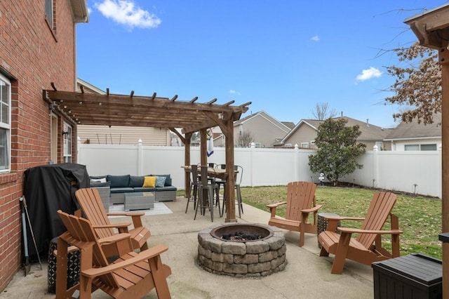 view of patio featuring an outdoor living space with a fire pit, grilling area, and a pergola