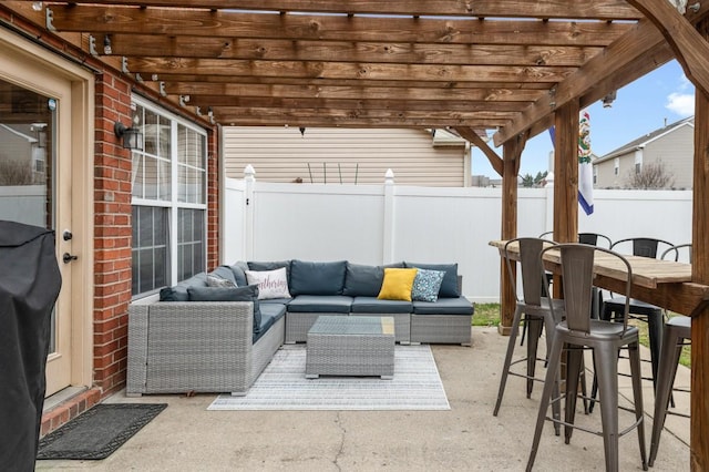 view of patio / terrace featuring an outdoor living space and a pergola