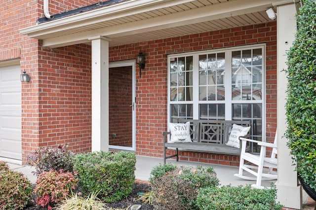 property entrance featuring a porch