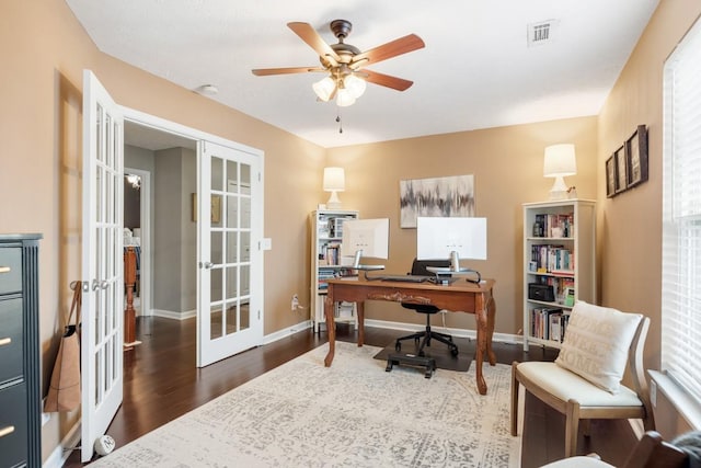 office area featuring french doors, ceiling fan, and dark hardwood / wood-style flooring