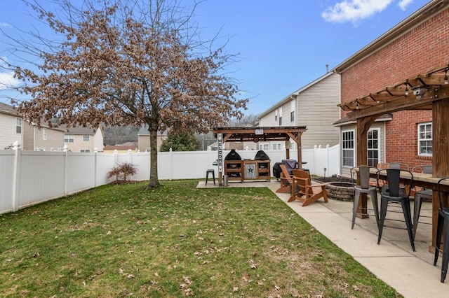 view of yard featuring a patio, a gazebo, and an outdoor fire pit