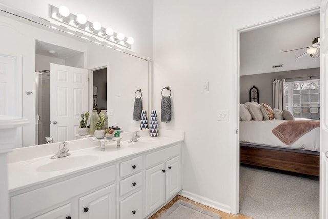 bathroom featuring vanity and ceiling fan