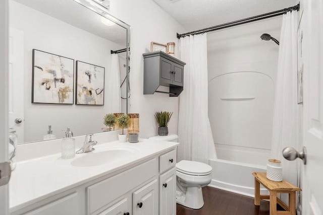 full bathroom featuring shower / bathtub combination with curtain, vanity, hardwood / wood-style flooring, and toilet