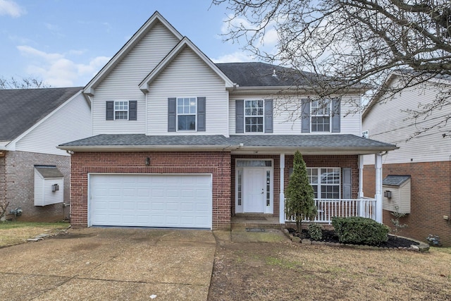 front of property with a garage and a porch