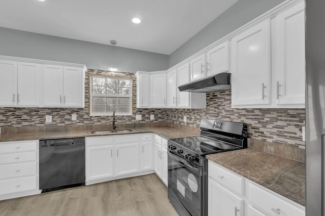 kitchen featuring white cabinetry, sink, black appliances, and light hardwood / wood-style floors